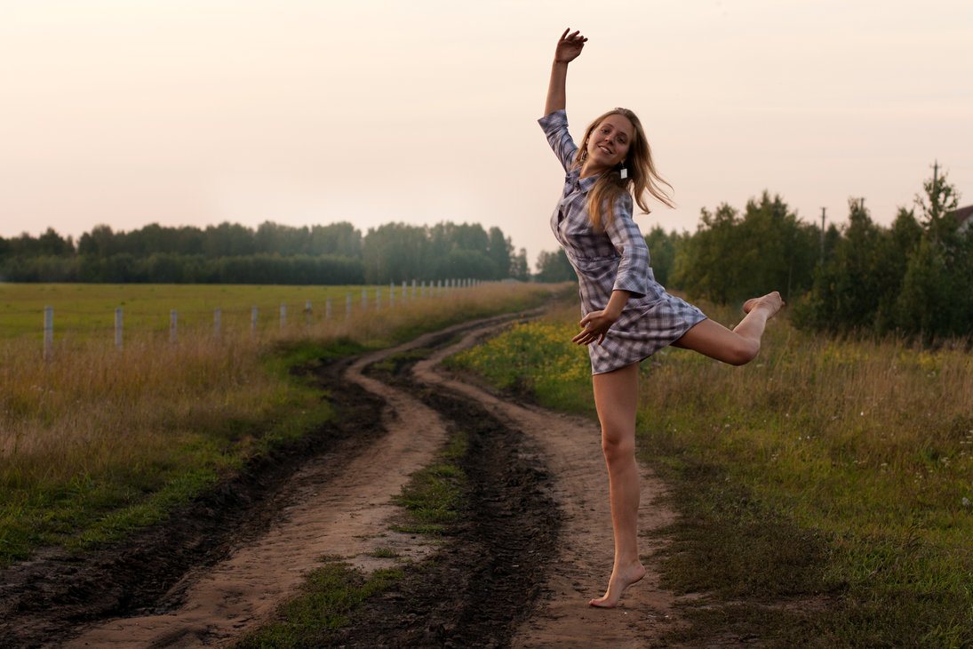 young girl dancing happy in a field by camaliaxcarmen d60am28 Freedom is always available. Will you pay the price?
